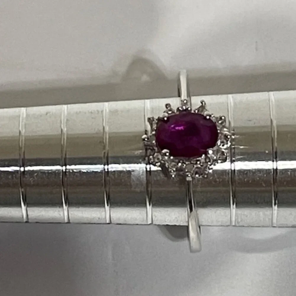 Sterling silver and red gemstone ring. Appx. size 6 1/4.